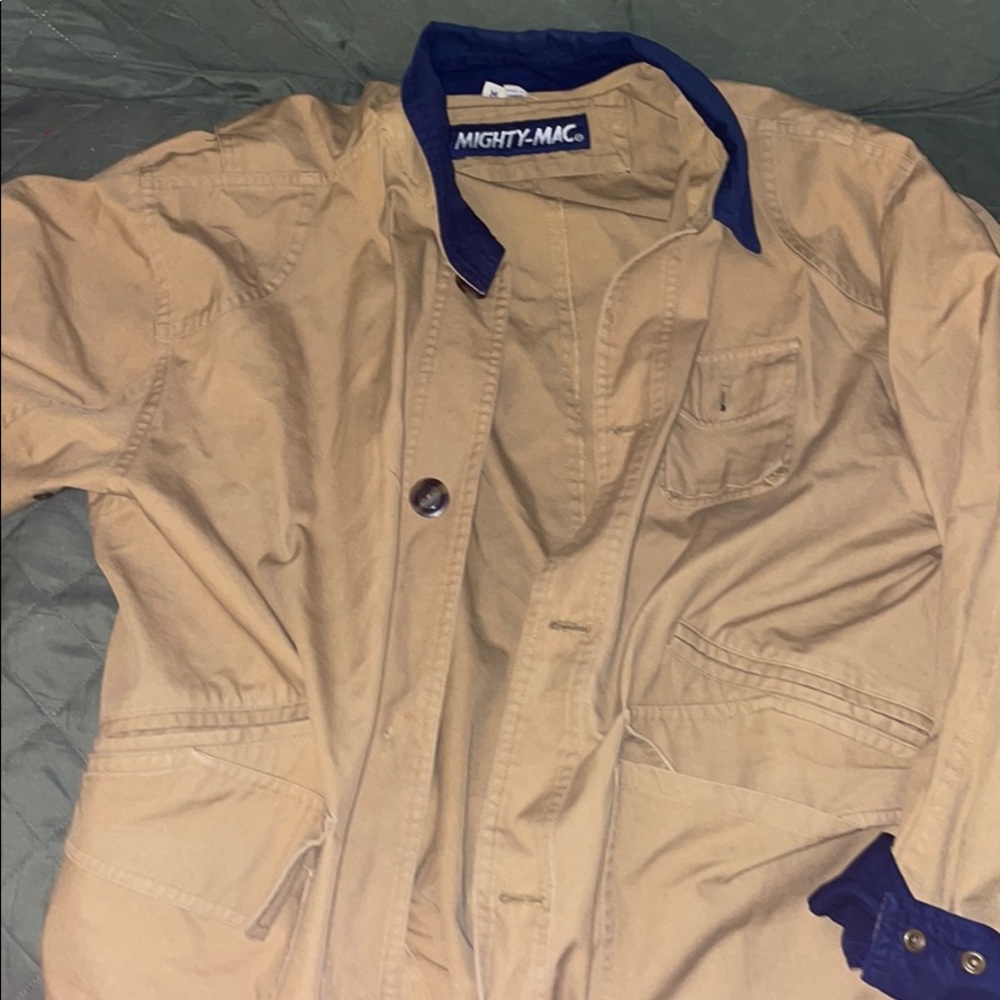 tan jacket with navy detailing